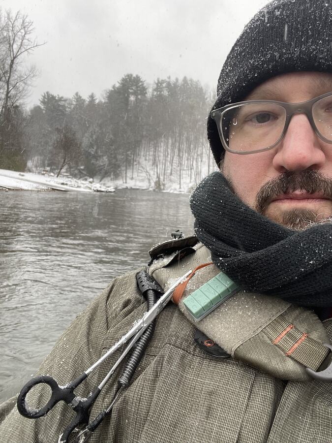 Chris in the snow at Tippy Dam
